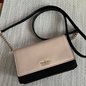 Kate Spade Sm Tan and Black Crossbody
(Possibly Madison Mini Flap Crossbody)